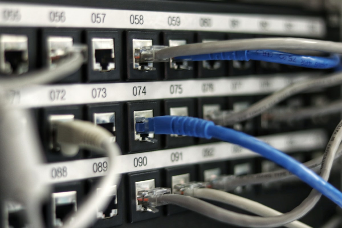 Network patch cables neatly routed in a server rack.